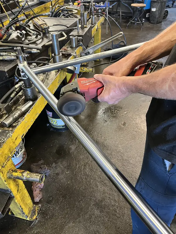 Hydraulic cylinder rod being polished